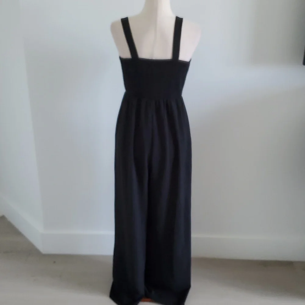 Dokotoo  women’s Black Wide Leg Jumpsuit w/ smocked back Size L great condition_3